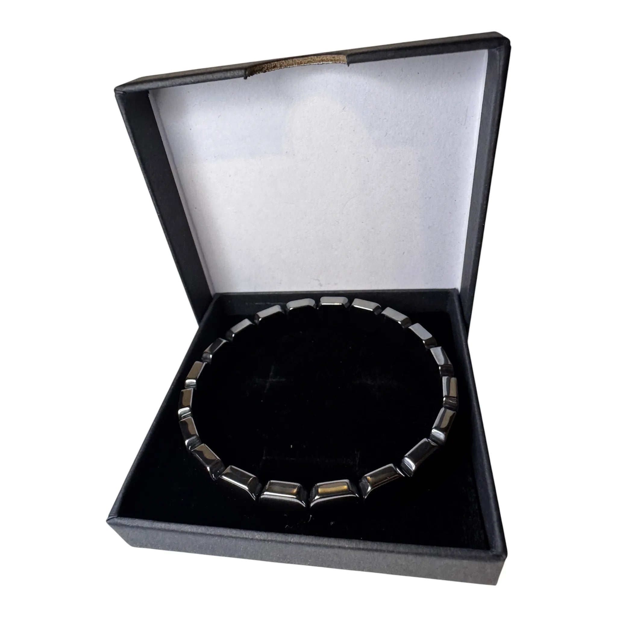 Men's hematite bracelet with dark metallic square beads on tattooed wrist